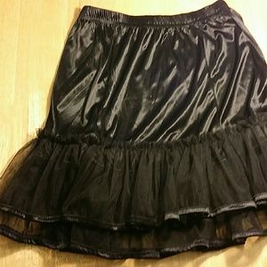 Black half slip with two rows of ruffles.